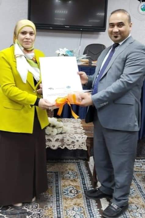 A teacher in Al-Nahrain Law participates in a symposium entitled “Criminal Response to Violence Against Women”